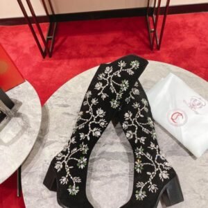 Christian Louboutin knee high heels